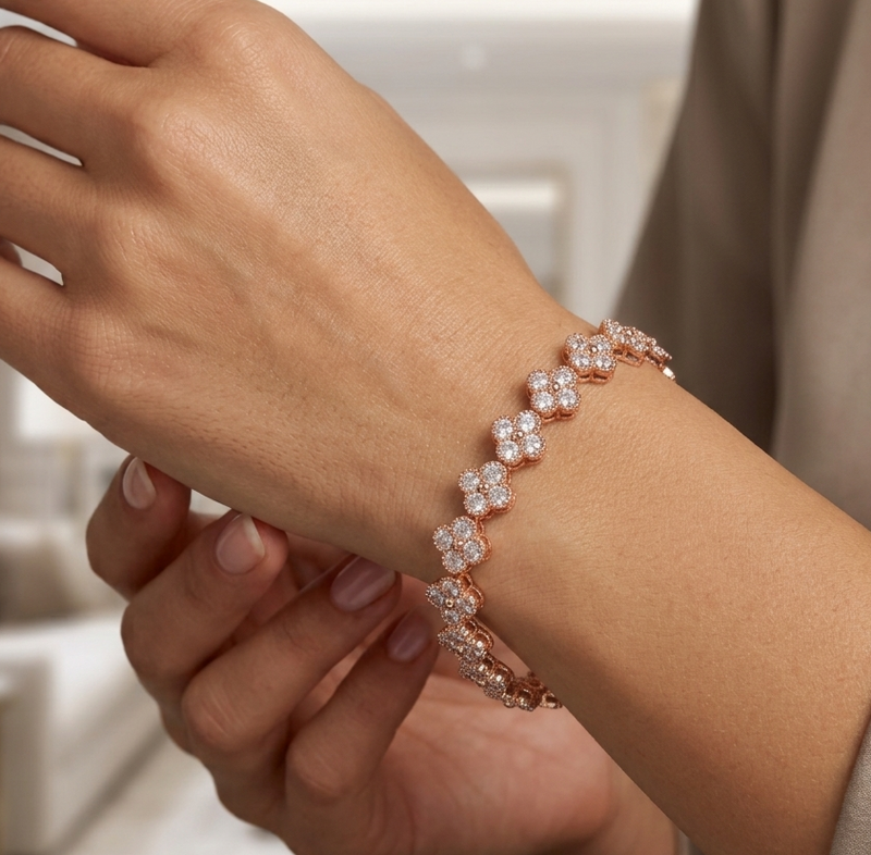 Rose gold floral tennis bracelet with crystal embellishments
