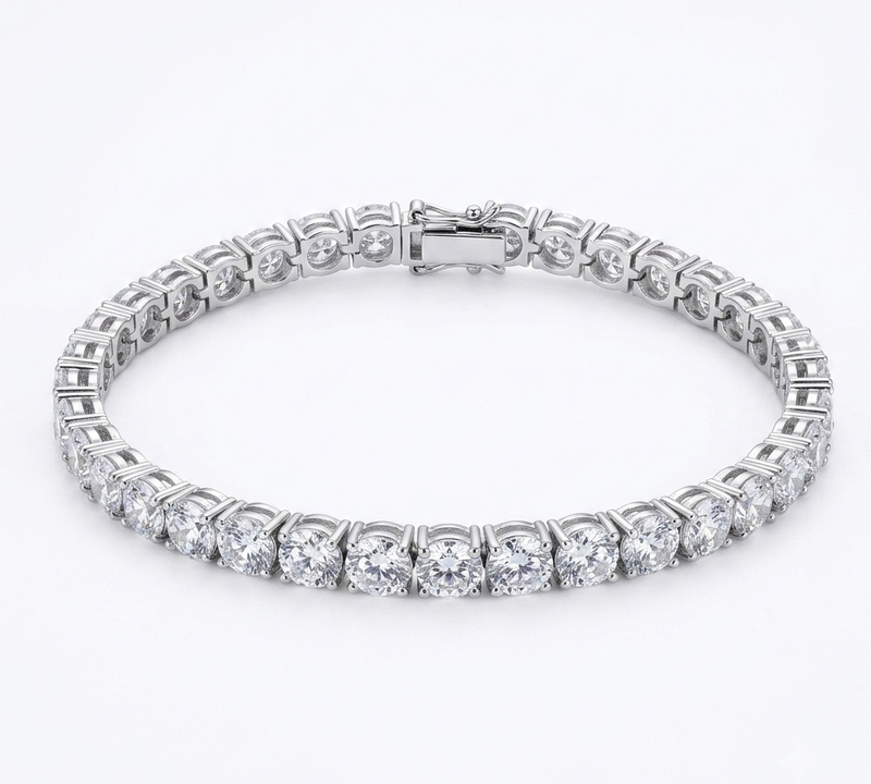 Silver classic tennis bracelet flat lay on white background