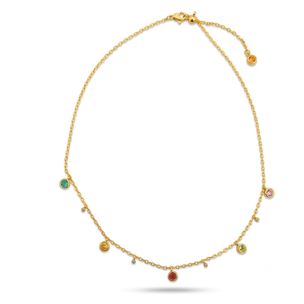 Gold multicolour crystal drop charm necklace flat lay on white background
