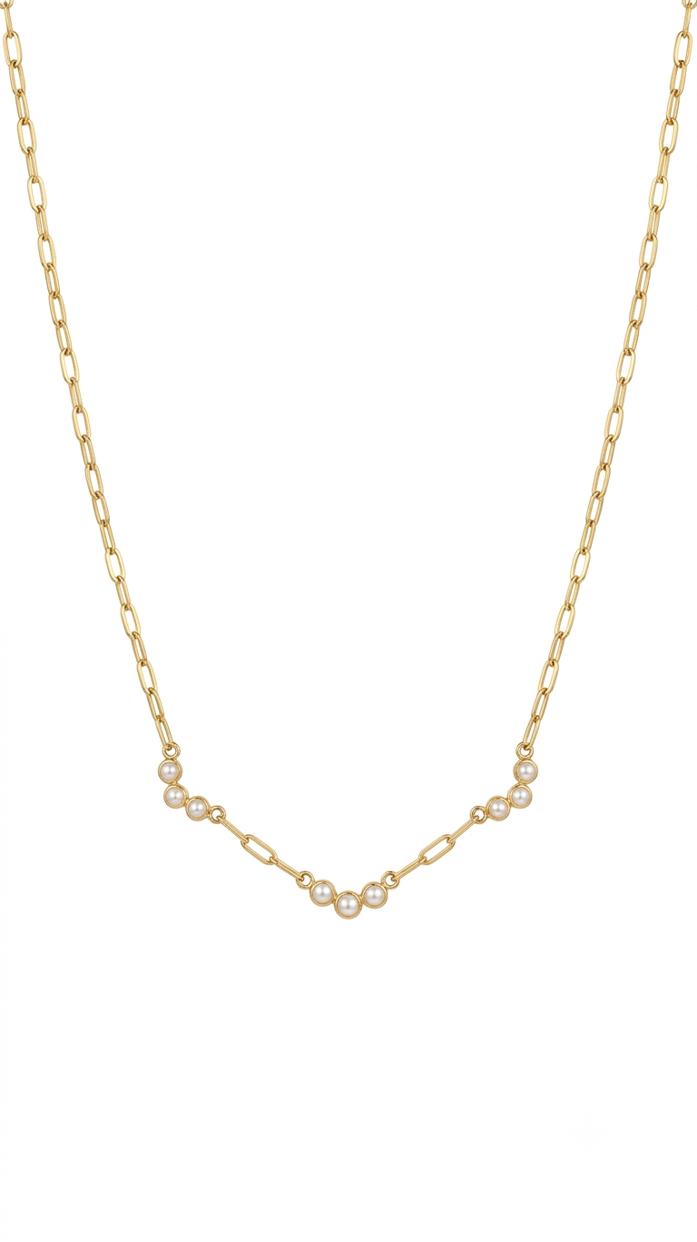 Gold paperclip chain pearl arc necklace on white background