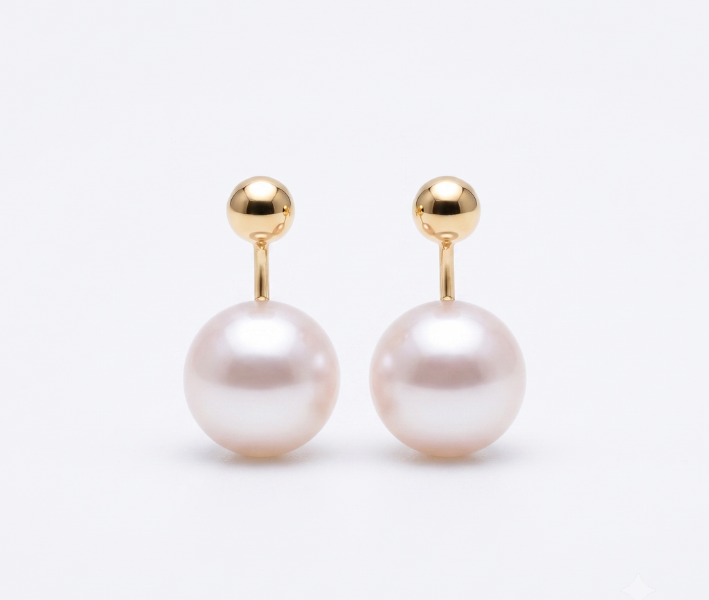 Gold ball and pearl jacket earrings product shot